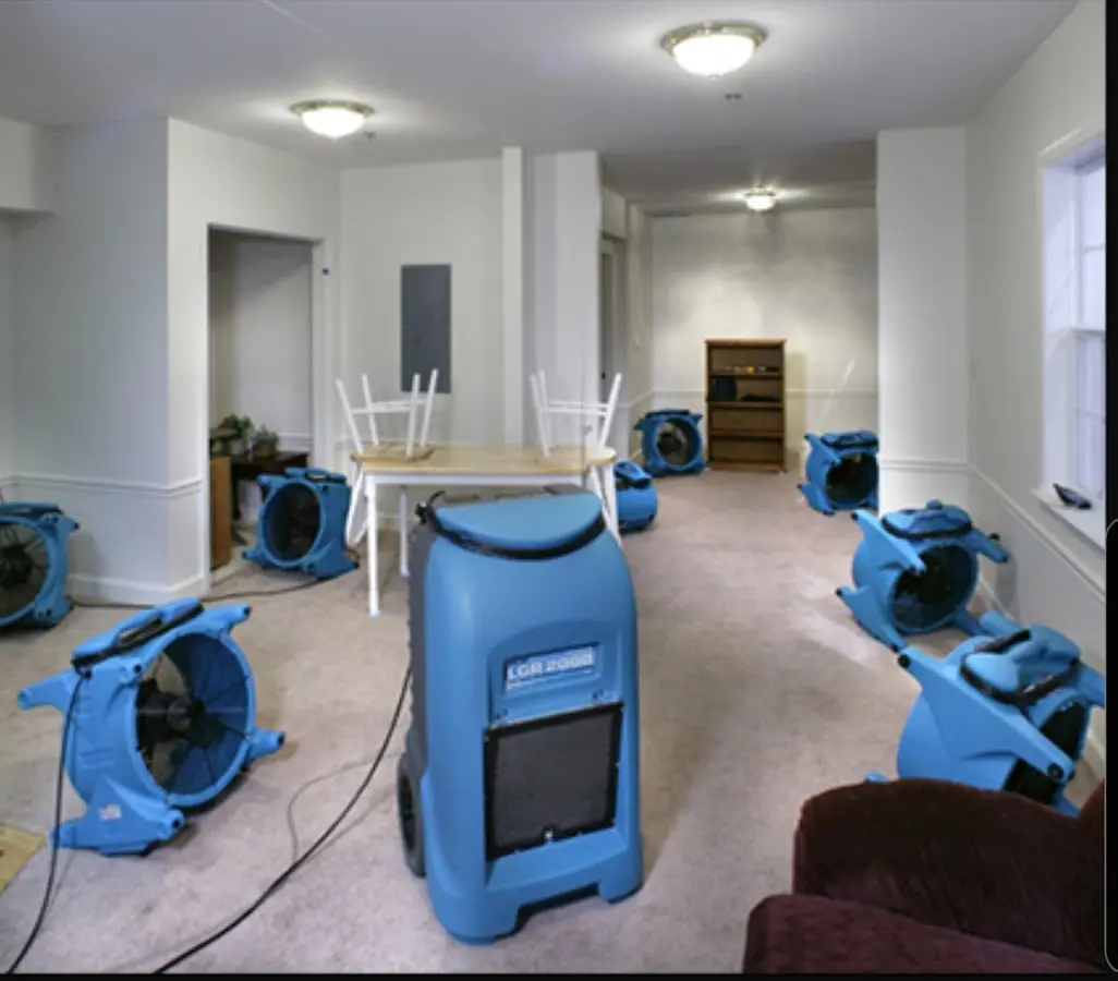 Air movers and dehumidifier setup for Water Damage Restoration in New Kensington
